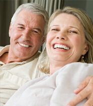 elderly couple smiling